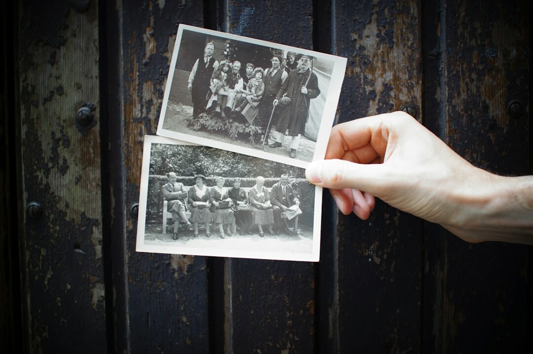 man with old photo