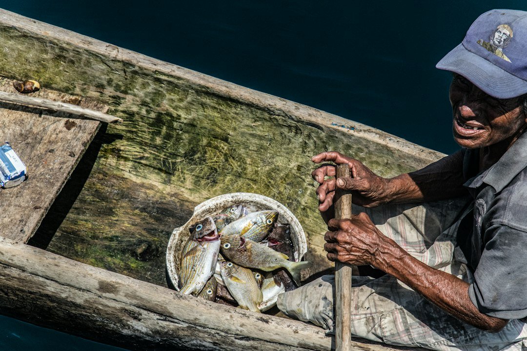 old fisherman on boat
