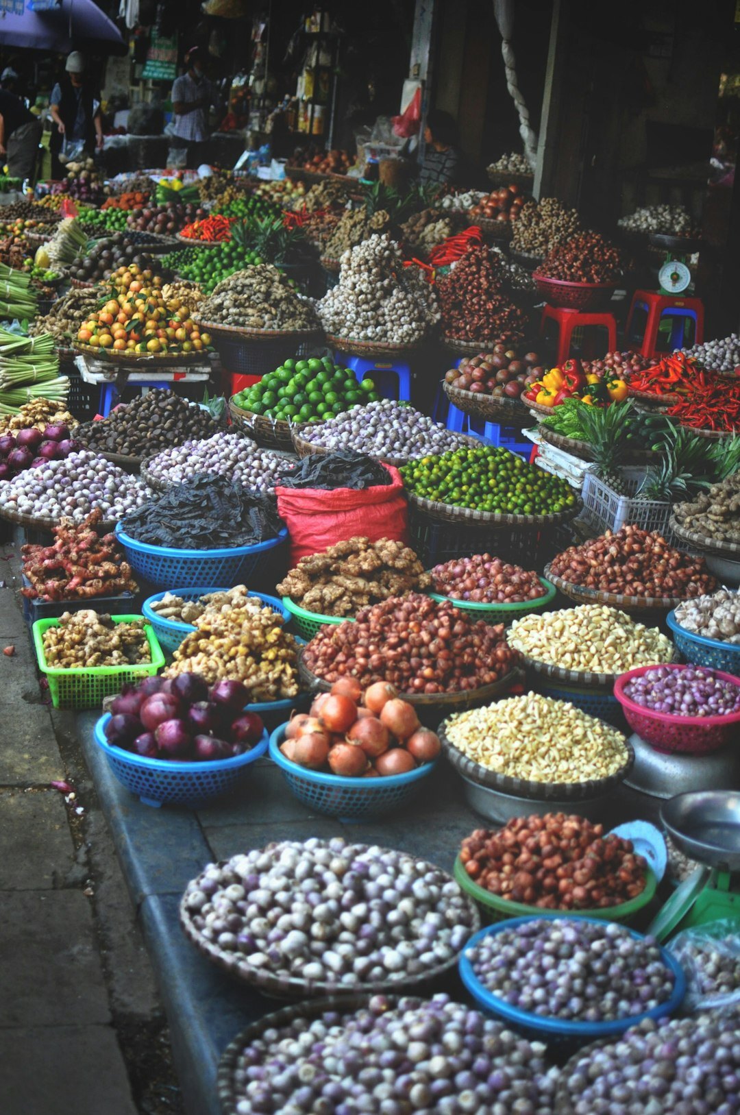 Outdoor local market stall with Danish vendors and customers