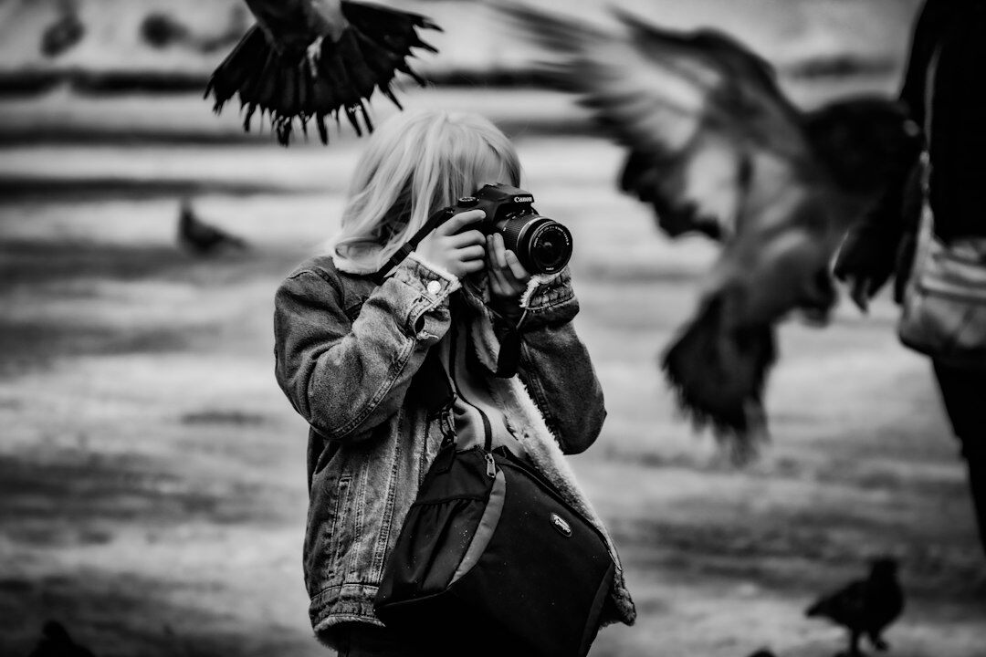 Portrait of a young Danish female photojournalist smiling