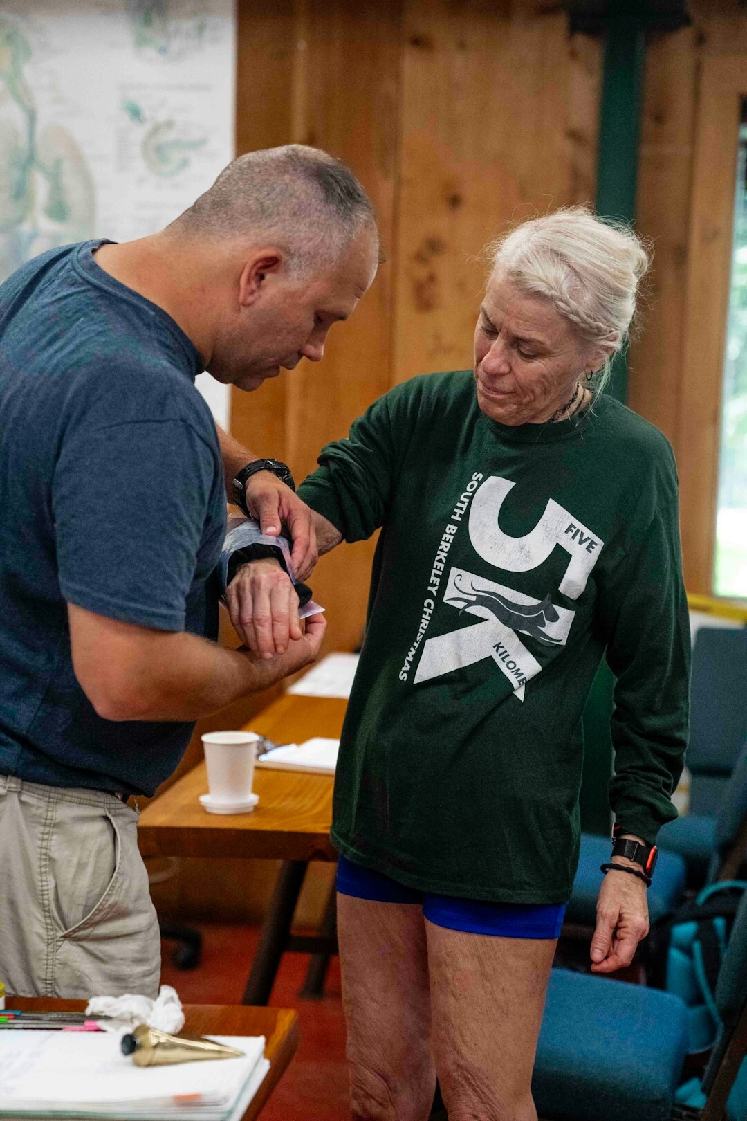 community volunteer helping elderly