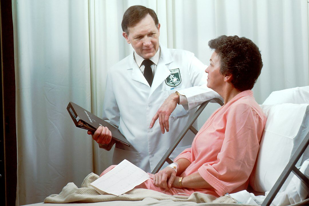 nurse caring for patient